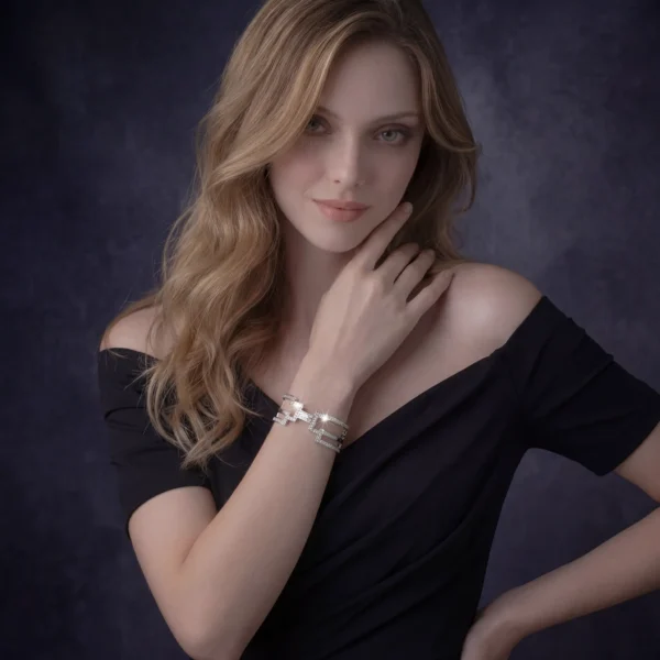 A woman posing in an elegant black dress with a focus on her sparkling, wide-link geometric diamond bracelet.