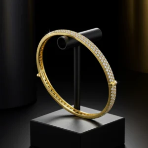 Minimalist Lustre Line 18k gold bangle encrusted with three rows of diamonds, displayed on a black jewelry stand.