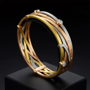 18k gold white gold and rose gold interlocking diamond bracelet on display