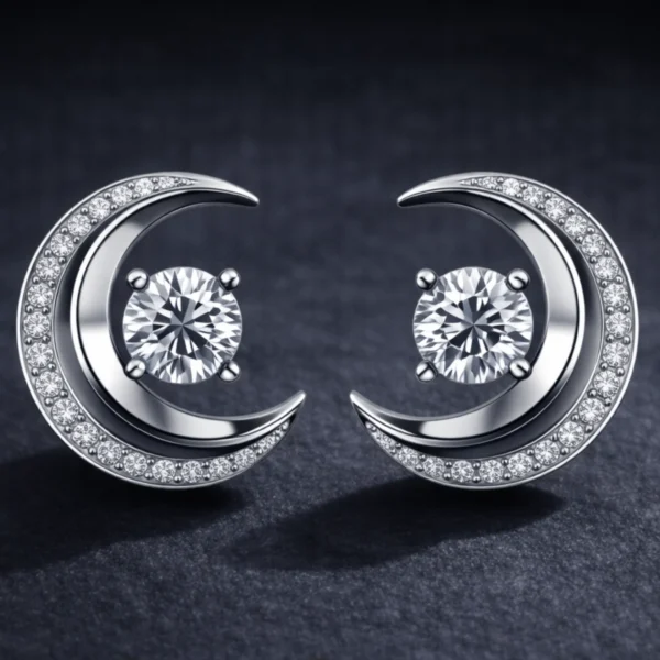 Pair of silver crescent moon diamond earrings