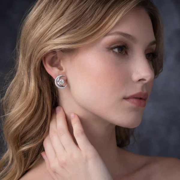 Side view of moon earring on model