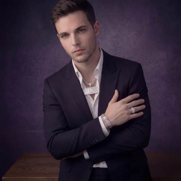 iced-ix-monogram-set Silver IX pendant and matching bracelet on male model