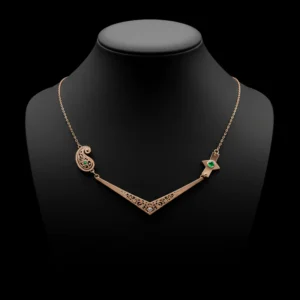 Luxury Kismet Constellé necklace with emerald accents