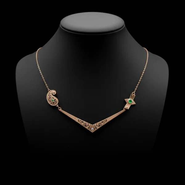 Luxury Kismet Constellé necklace with emerald accents