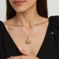 Front view of the Eterna Lotus Royale necklace worn by a model.