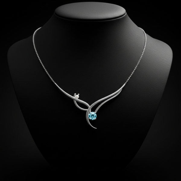 luminous-harmony-display Luminous Harmony necklace featuring a blue crystal and pearl on a black display bust.