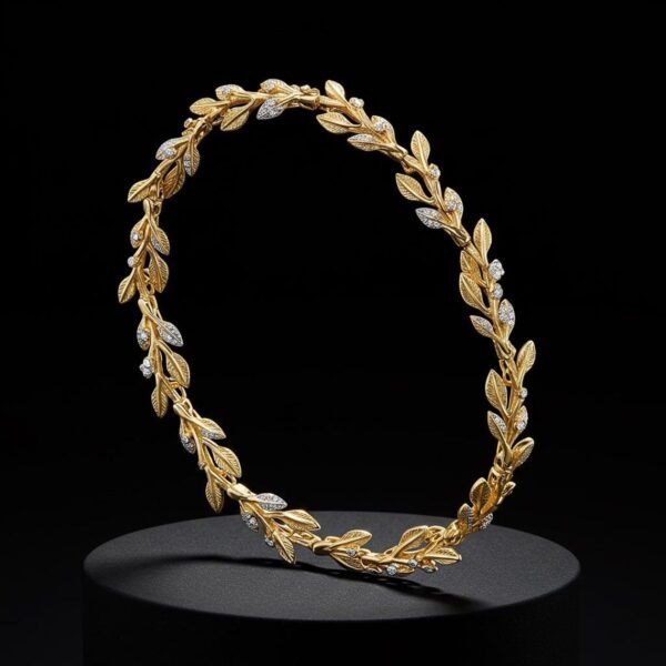 18k gold Elora Vine bracelet with diamonds on black pedestal.