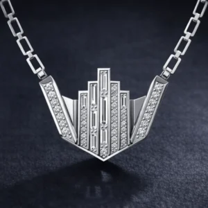 Macro studio shot of diamond-encrusted skyline pendant.