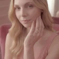 Woman wearing the rose gold whisper ring.